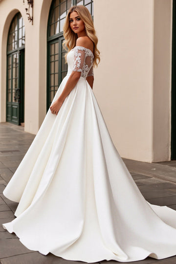 lvory Une ligne dénudée d’épaule Robe de mariée longue appliquée